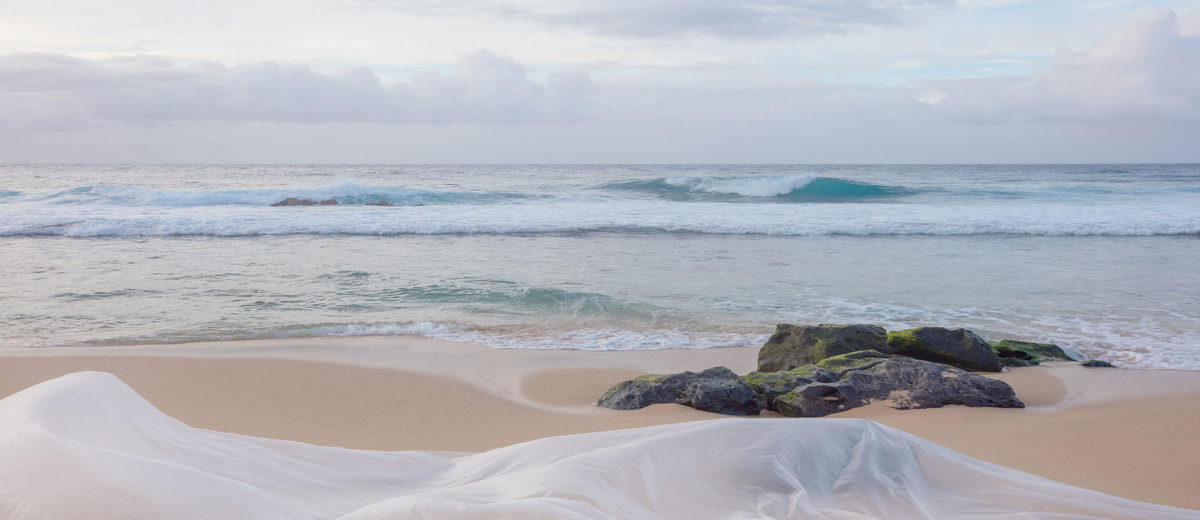Sandy Hawaiian beach and oacean art.